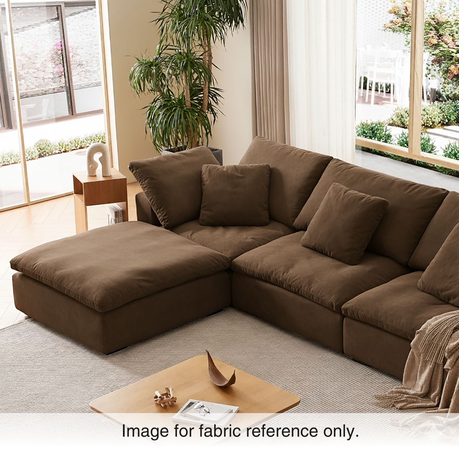 Brown velvet couch with rich dark fabric and plush texture, arranged in a contemporary living space from the Tivoli Velvet Sofa Collection by Mario Capasa.