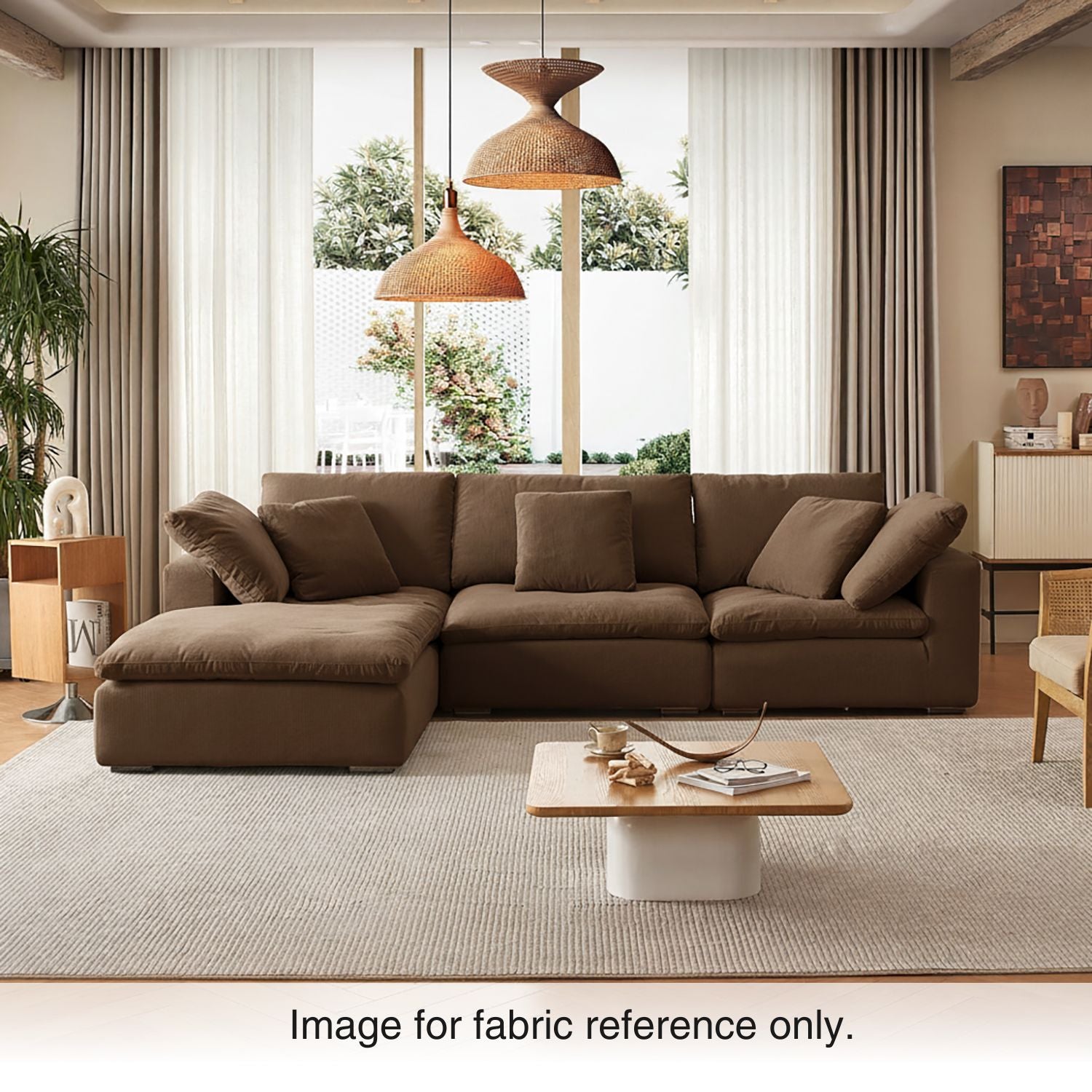 Modern living space with a brown velvet sectional sofa and warm neutral palette, part of the Tivoli Velvet Couch Collection by Mario Capasa.