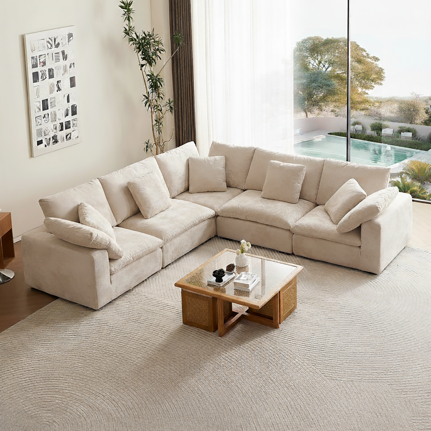 Beige sectional sofa in a modern living room with a coffee table and decorative items.