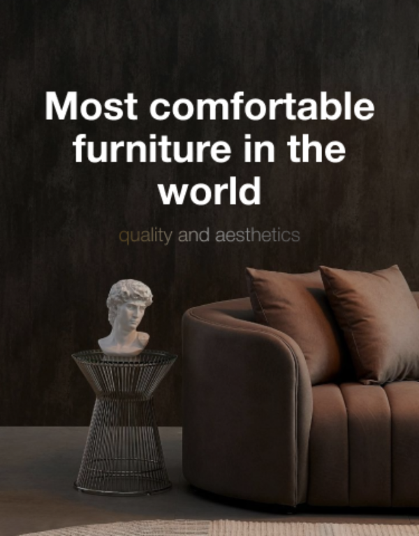 Brown sofa with decorative pillows and a small table in a dark room.