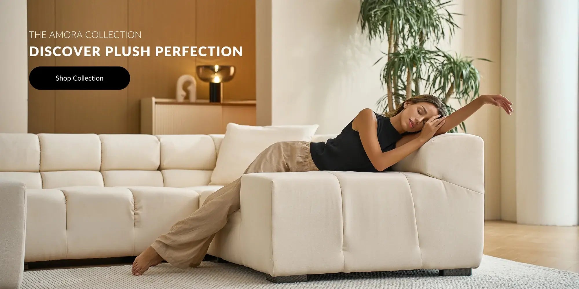 Woman relaxing on a beige modular sofa by Mario Capasa in a modern living room