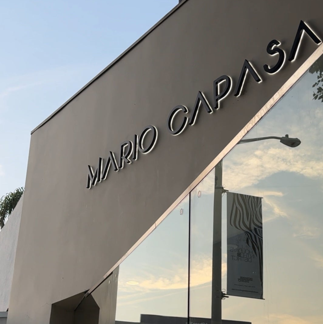 Miroir Capas store entrance with reflective glass facade