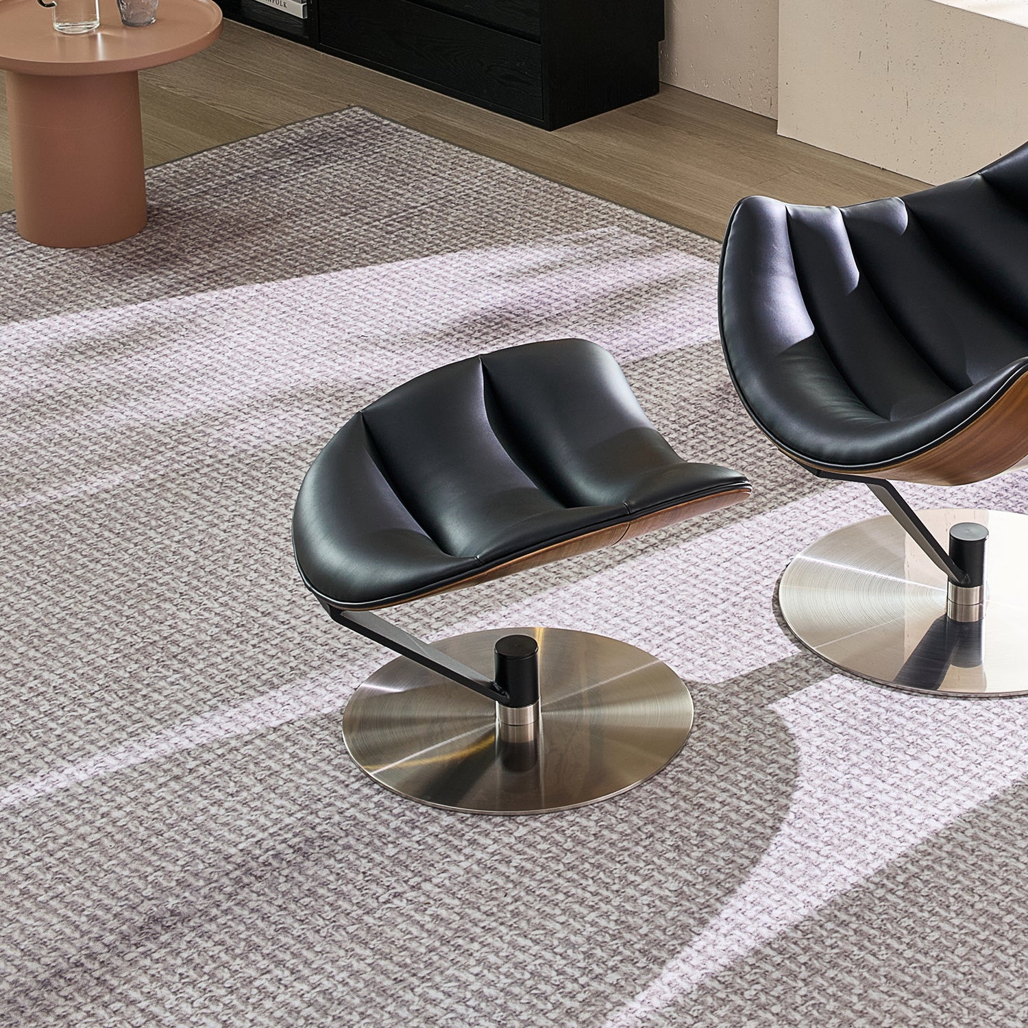 The Avant Glide Chair and Ottoman