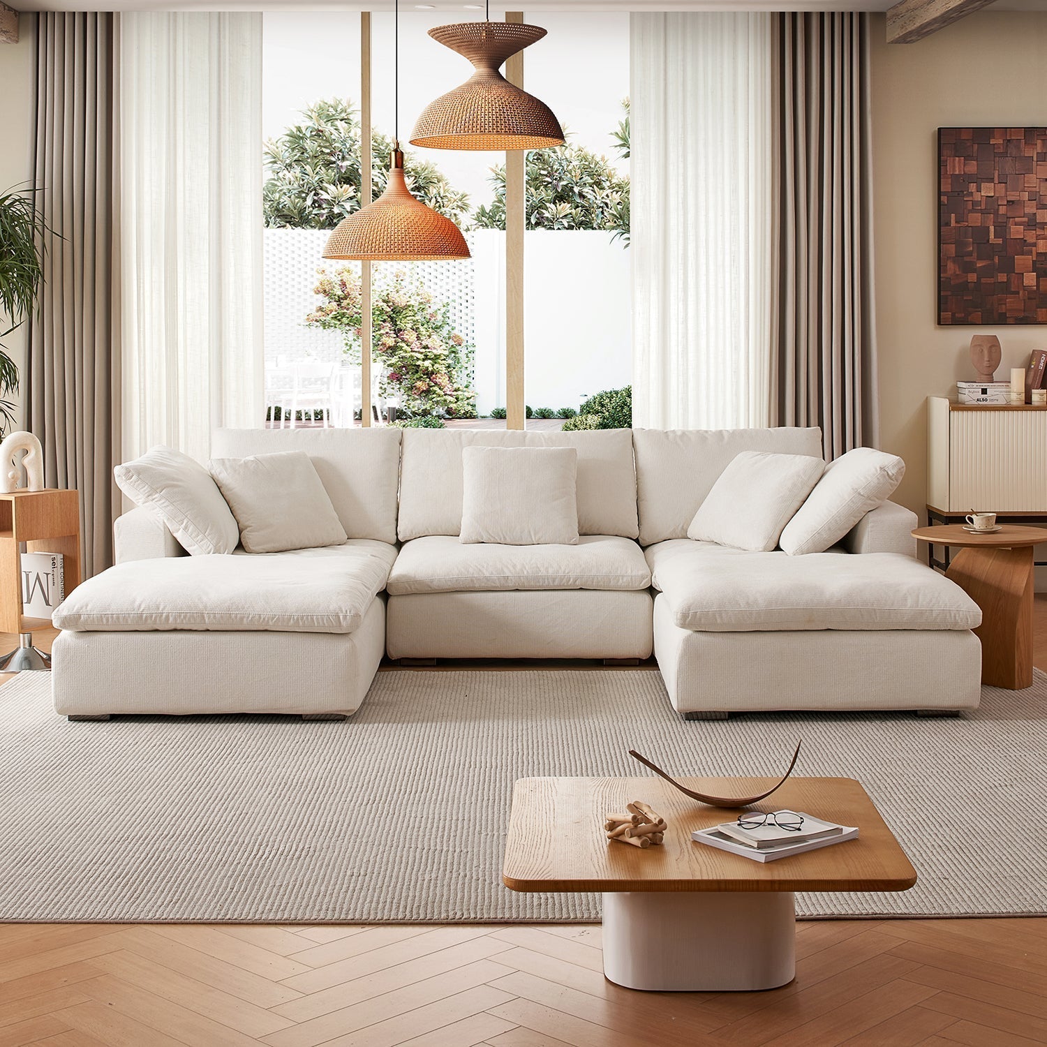 cloud couch dupe in modern living room with oversized cushions and coffee table