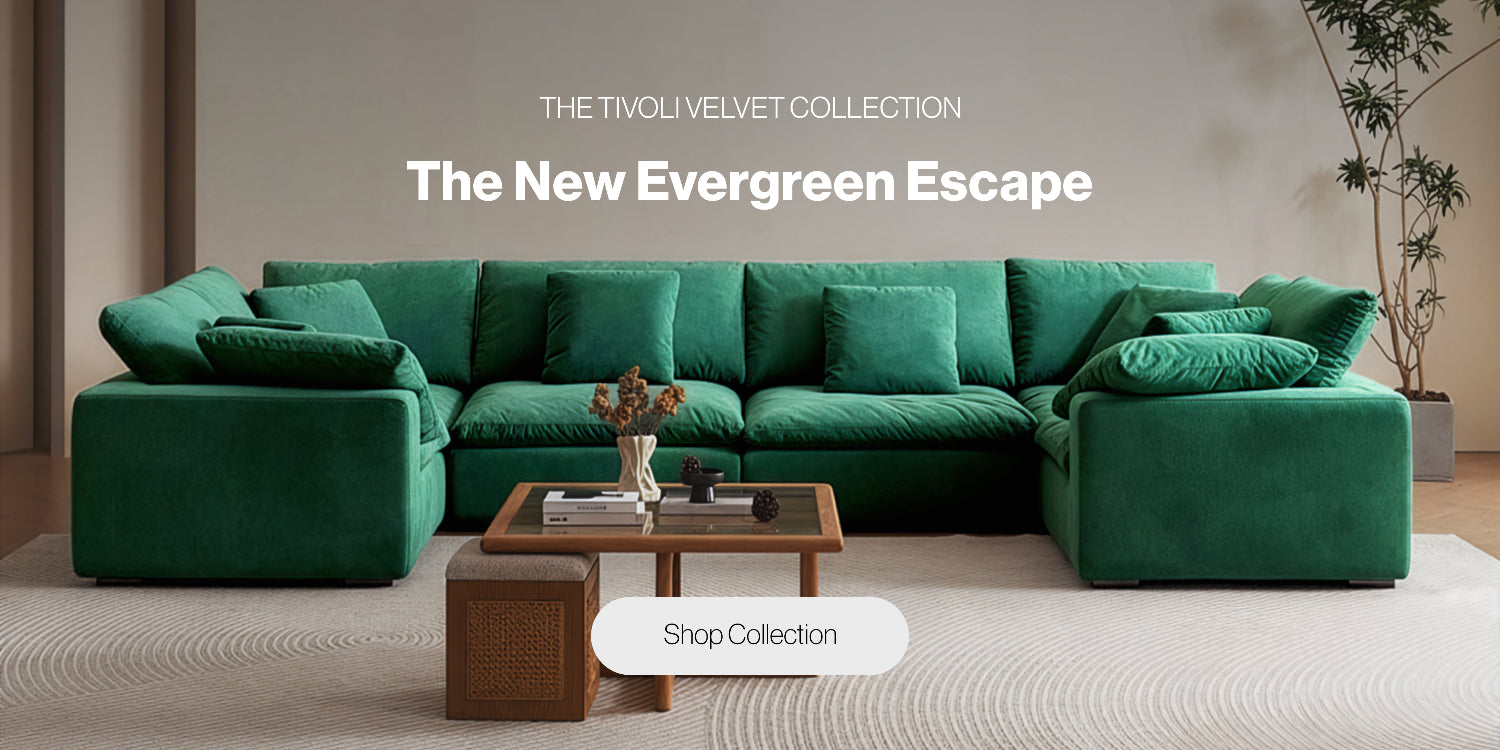 A rich green velvet sectional couch from Mario Capasa